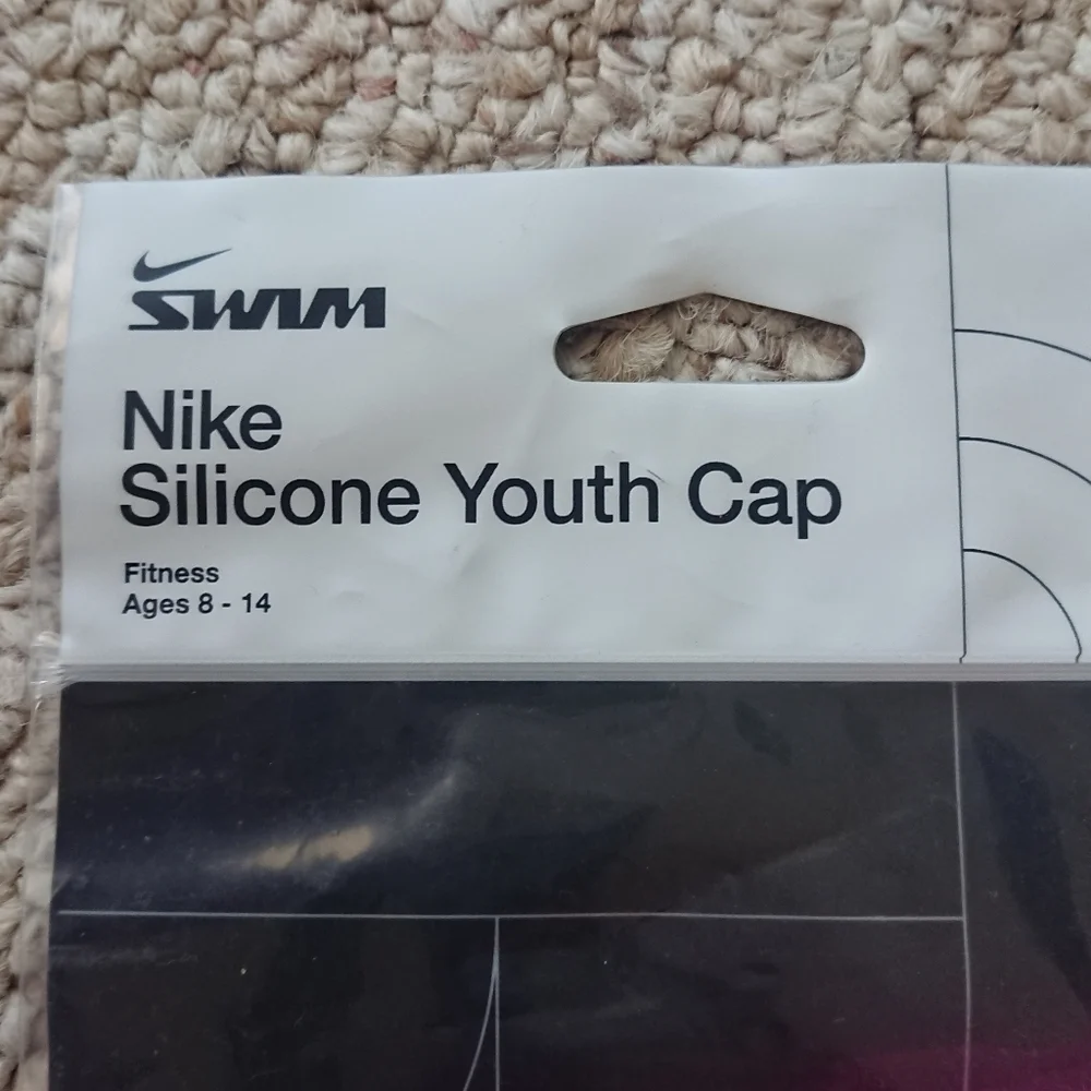 Nike Silicone Youth Swim Cap in pink for ages 8-14